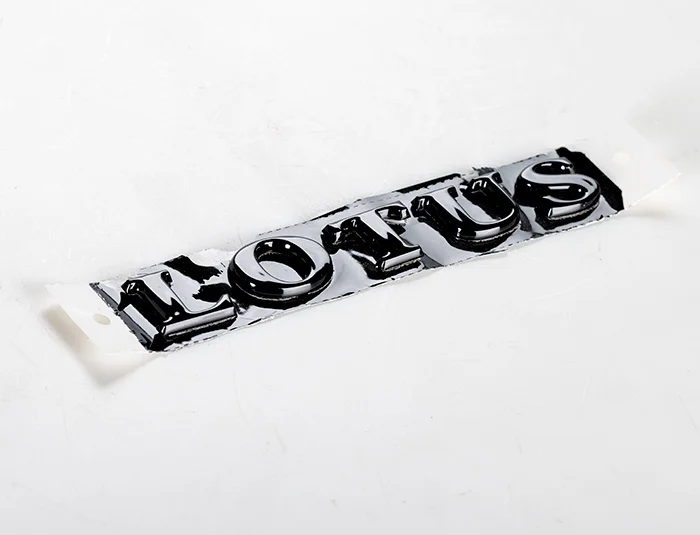 A132U0988S BADGE-LOTUS LETTERS BLACK - Image 1